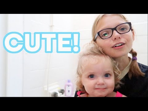 GIVING BABY SISTER A BATH FOR THE FIRST TIME! BIG SISTER ROUTINE!