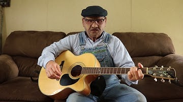 Mr.  Jones playing his guitar