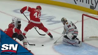 Red Wings' Dylan Larkin Scores Power Play Goal Off Sweet Between-The-Legs Feed From Alex Chiasson