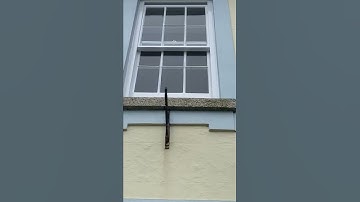 Before and after restoration and draught proofing of a sash window in a listed property