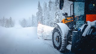 Snow plowing in a beautiful Swedish landscape
