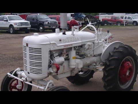 Video: Bagaimana Anda mengeja traktor Farmall?