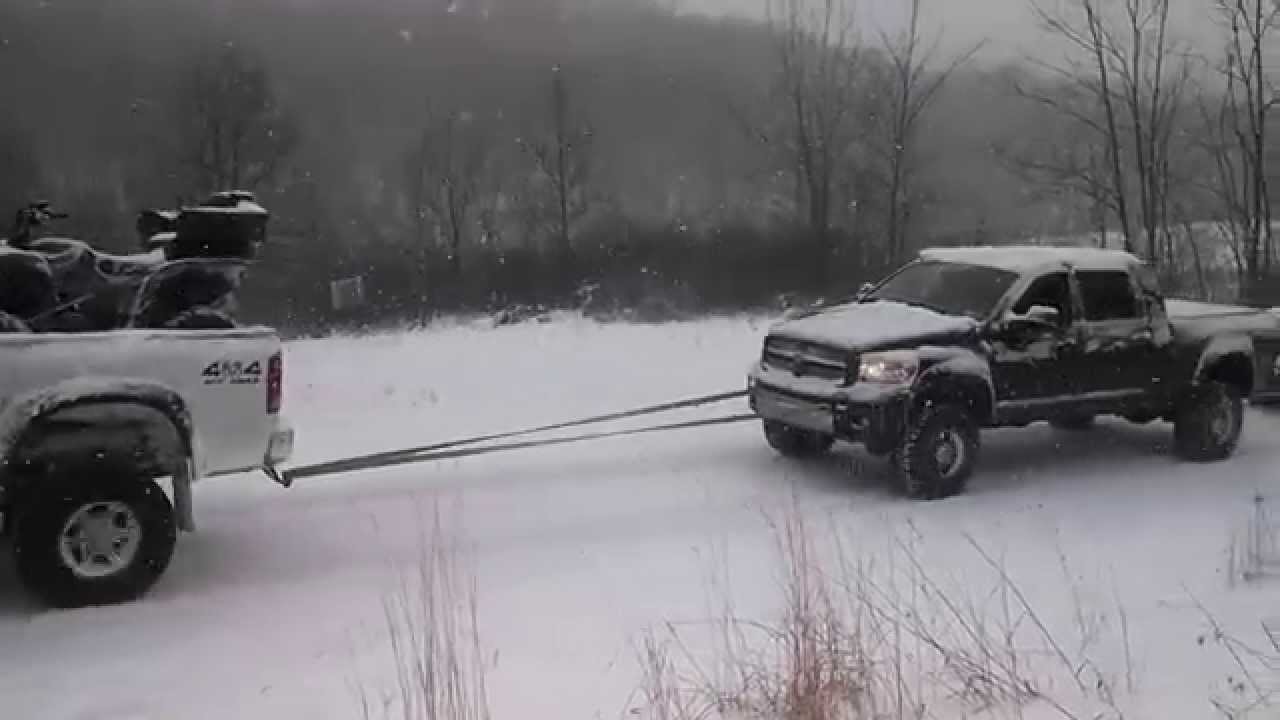 Cummins pulls duramax up back road hill - YouTube