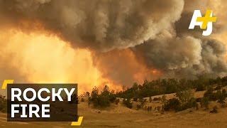 The rocky fire is burning out of control in northern california,
helped by dry ground. wildfire has burned more than 100 square miles
– 65,000 acres an...