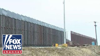 14 miles of old border fencing from the 1990s has been replaced in san
diego, california with another secondary being added; william la j...