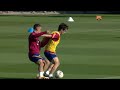 La Masia players train alongside Barca first team members