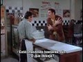 Seinfeld-Kramer buys calzone for George-Newman doesn't work in rain--The Calzone