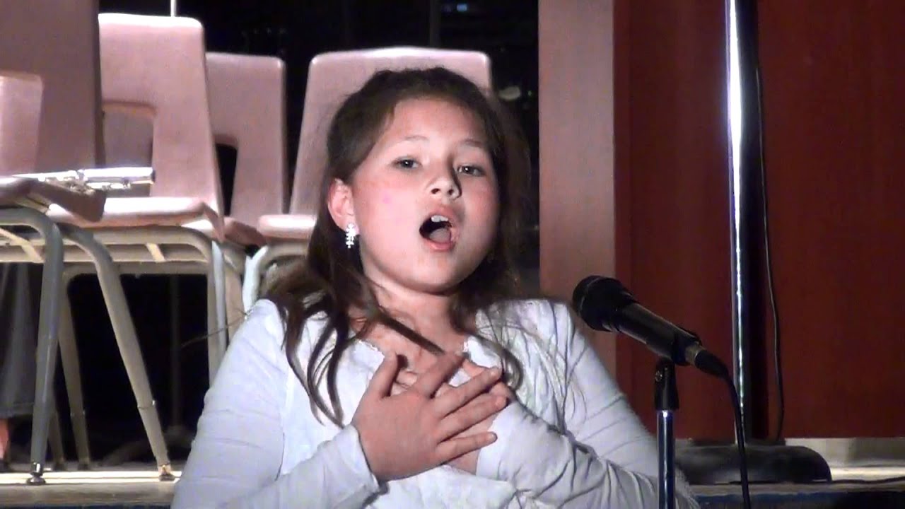 Isabelle singing at school musical show - YouTube