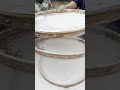 Hand-sifting flour, a dedication to traditional craftsmanship!