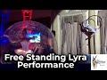 Free standing lyra performance by kikimora studio dancers at a miami event