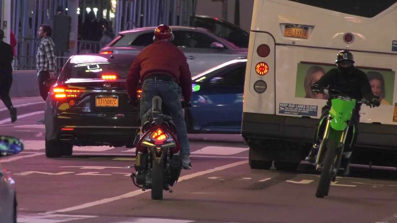 Dirt Bikes do Wheelies, Ride Against Traffic / Times Square, NYC YouTube