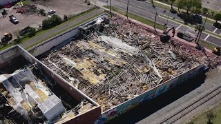 Demolition crews in Springfield clear condemned building following sudden collapse