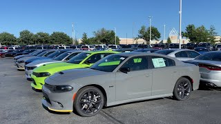 Walking around a Dodge dealership looking at 2023 Chargers and Challenger s last of the V8 s