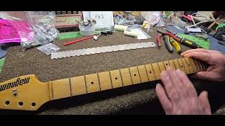 Guitar repair.  filing frets after installing new ones. some friendly advice on my approach. 2024