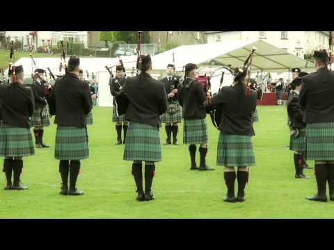 NOTE: The second drum roll at the beginning has been edited to exclude an intrusive noise which might have given the impression of a bad entry by the pipes. I haven't been able to do this very expertly, so apologies to the band whose start was perfect. Scottish Power Pipe Band playing at Gourock Highland Games on 9 May 2010. The band won the Grade One competition playing the following tunes: Castle Dangerous, The North Star, The Millstead, Salute to Jack Henderson, Struan Robertson, The Hag at the Churn, Hanter Dro, and Golden Brown. The band's Pipe Major is Christopher Armstrong. I loved this - a medley and performance of exceptional quality.