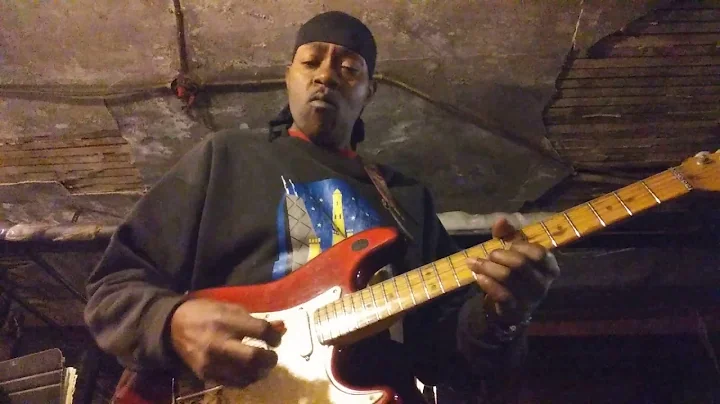 Masio playing the guitar