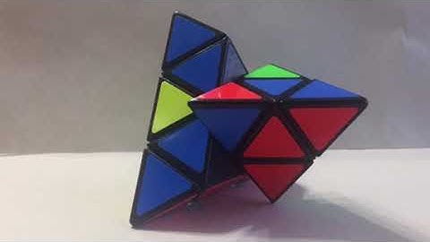 Pyraminx solving itself (stop motion)