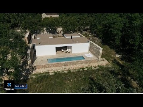 Vidéo: Une symétrie d'architecture défiant la maison par Rodney Walker