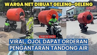 Online motorcycle taxi driver's insane stunt! Carrying a water tank on his motorcycle leaves neti...