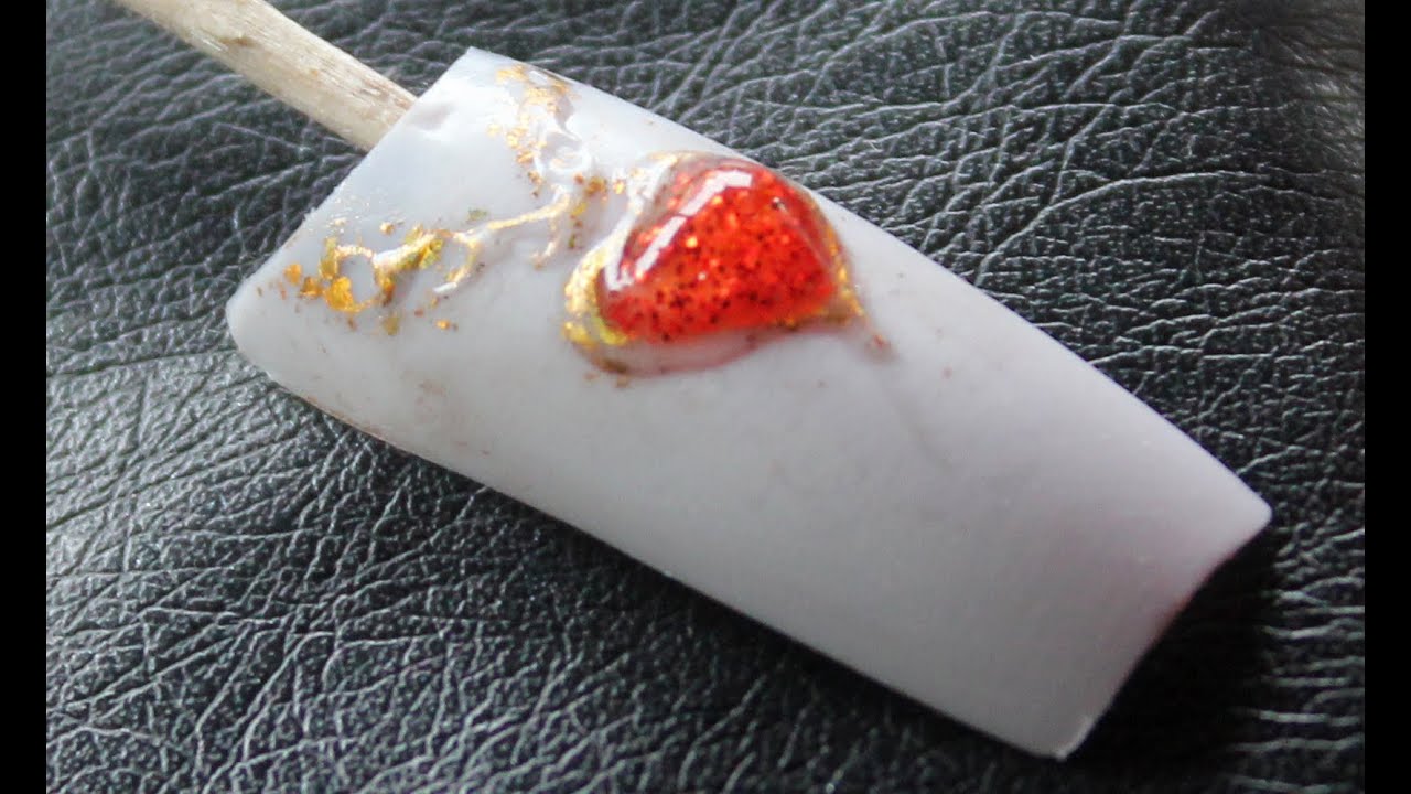Liquid stones nail art and gold embossed design jewellery nail art