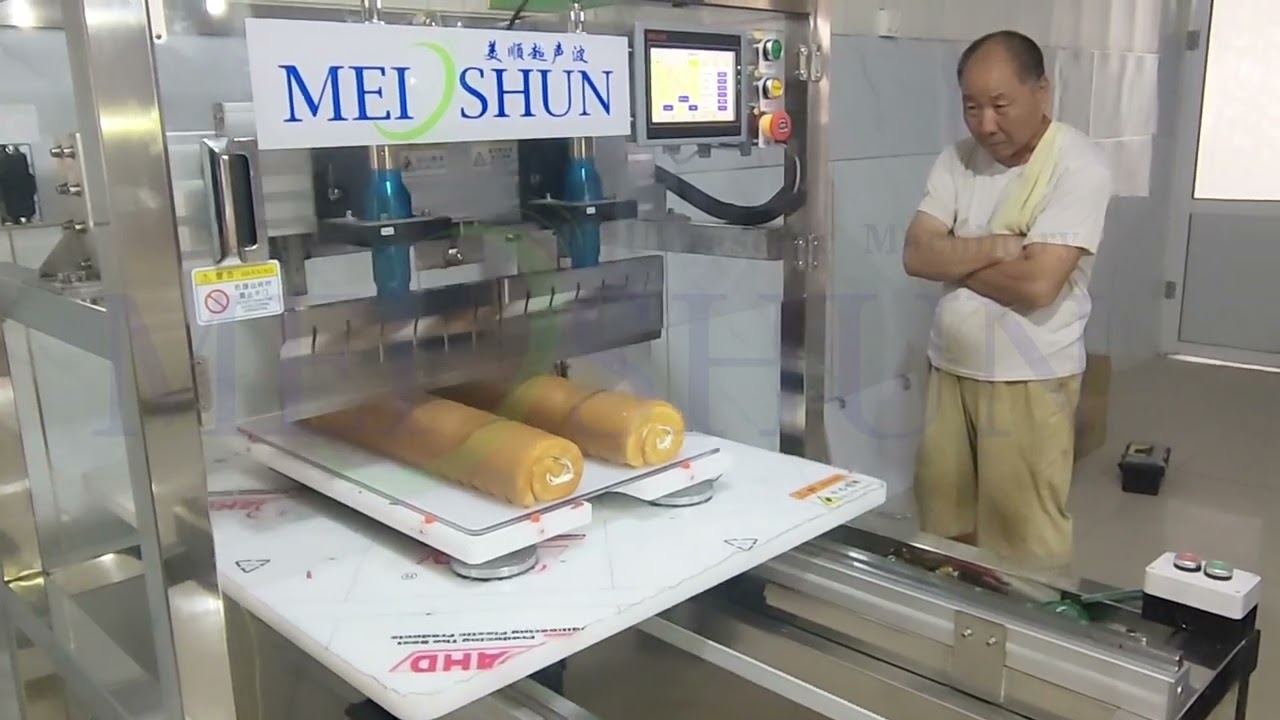 ultrasonic cake cutting machine for cutting sponge cake rolls or Swiss rolls | cake rolls slicing