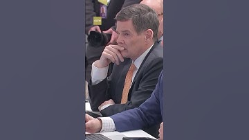 U.S. Fed cuts interest rates again, signals higher bar ahead