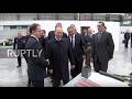 Russia: See Putin joke with overly 'serious' Kalashnikov employees