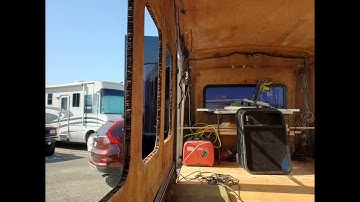 Shuttle Bus Conversion: Resealing the bus windows with silicone and butyl tape