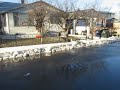 Southside neighborhood floods, then water freezes