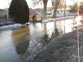 Southside neighborhood floods, then water freezes