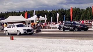 BMW 540i E39 4.4TT 2xHX35 vs Opel Vectra C20XE PTE6266 1/4 mile drag race