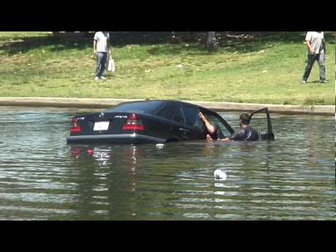 Driver is pulled from his sinking car in Lake Balboa