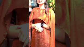 A stunning copper satin gown with cape sleeves, designed for a royal and graceful look.✂️