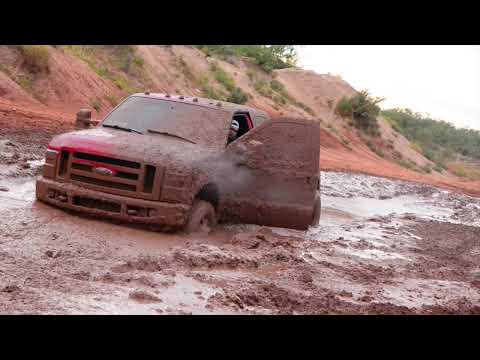 Big trucks go mudding in west Texas!