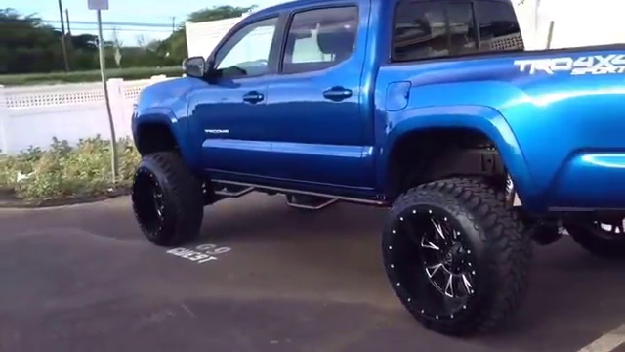 2016 lifted Toyota Tacoma w/ 6"fabtech lift, 22x14 rims , 12.5"x 33's