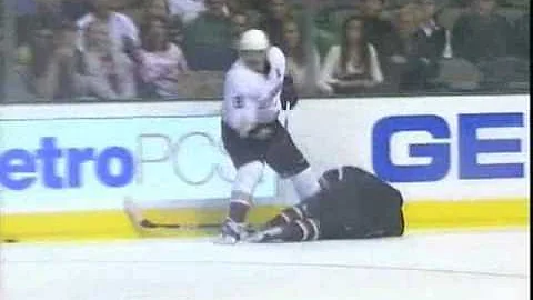 Tom Wandell hits Teemu Selanne and Selanne boards ...