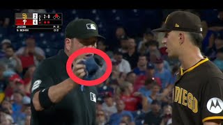 Alek Jacob is facing the first batter of his MLB career and the umpire asks him to remove something