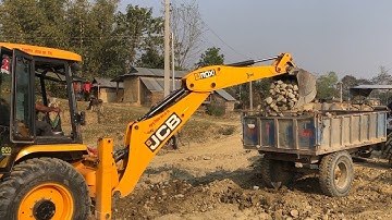JCB Backhoe Loader Loading Stone in Tractor