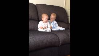 Twins fighting over toast