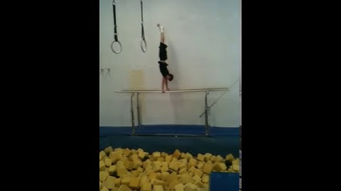 Double Backflip Parallel Bars