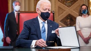 Biden rejoins Paris Agreement, reverses Trump immigration policies in first-day executive orders