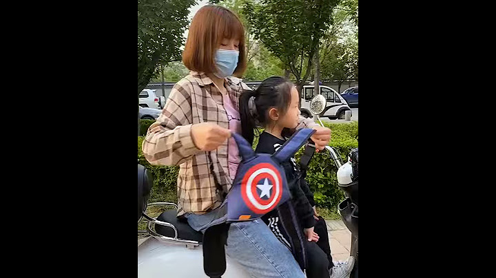 Mua đai an toàn cho bé khi đi xe máy