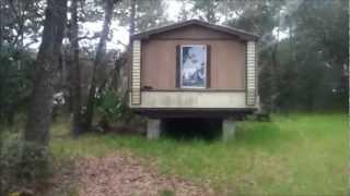 Two Hidden abandoned mobile homes