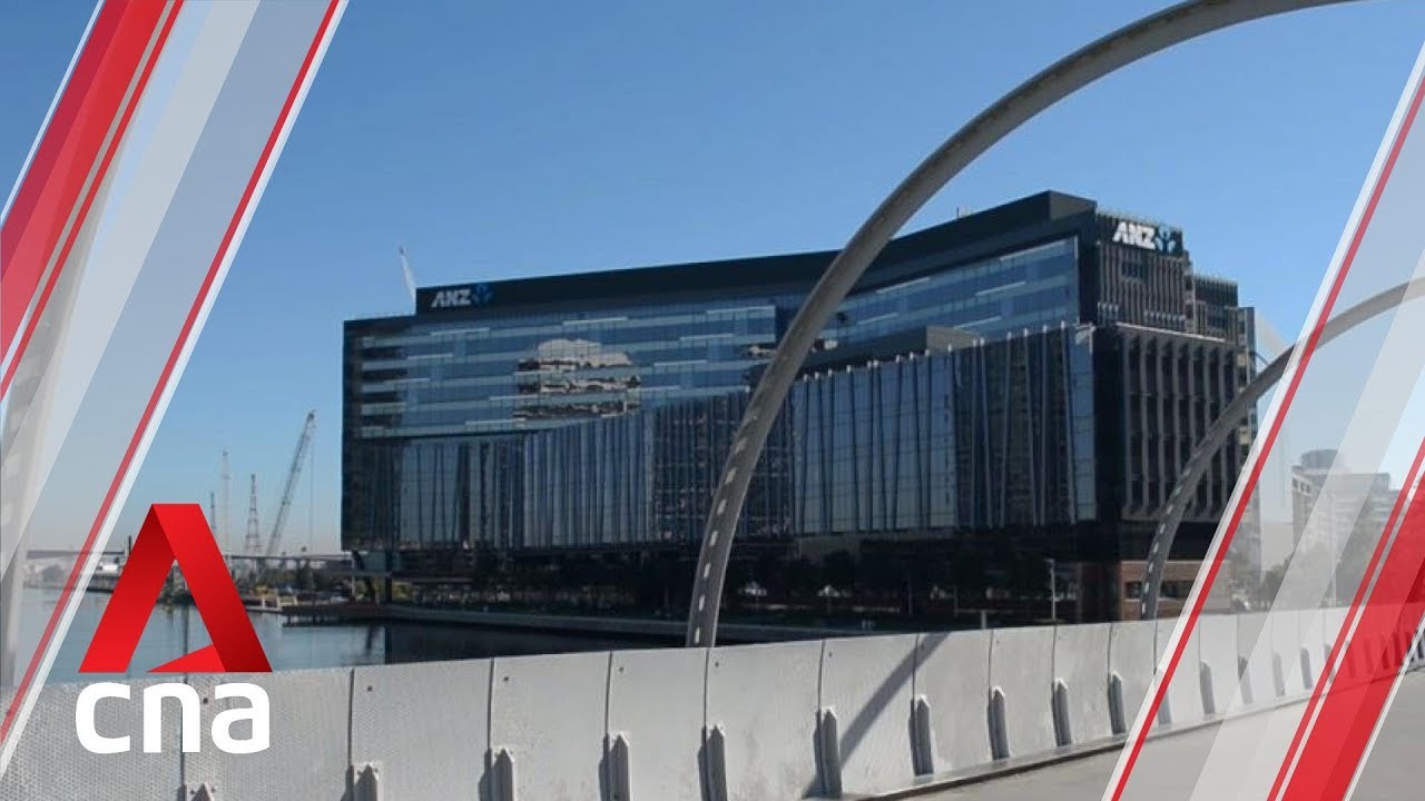 Australia cuts rates to historic low as economy slows