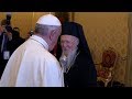 Patriarch Bartholomew gives Pope Francis  chocolates