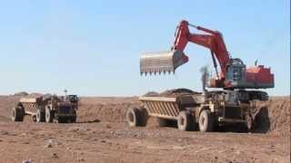 CAT 773B & HITACHI EX1200 Working 3