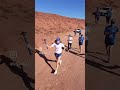 May 2026- Camille Herron carrying the peace torch with The Peace Run at the Valley of the Gods.
