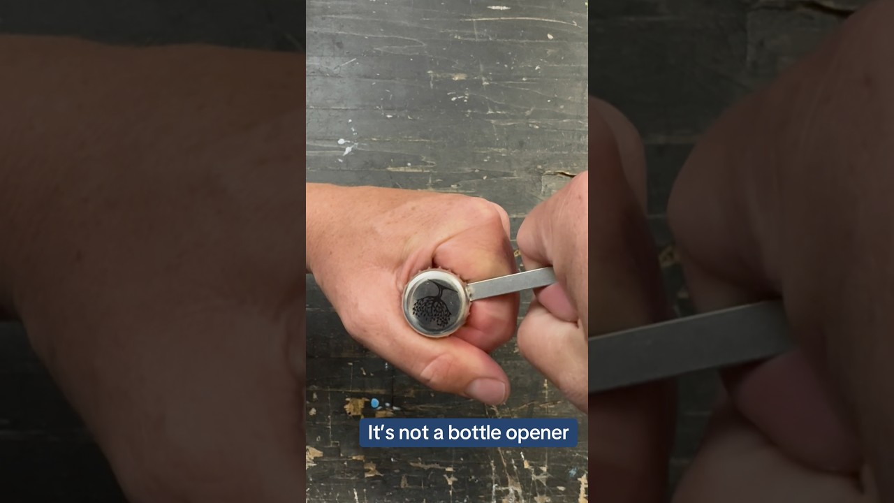 It’s not a bottle opener. Just a minimalist keychain prybar. 