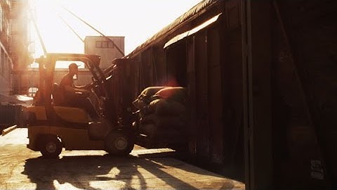 Forklift Truck is Loading Train With Cargo | Stock Footage - Videohive