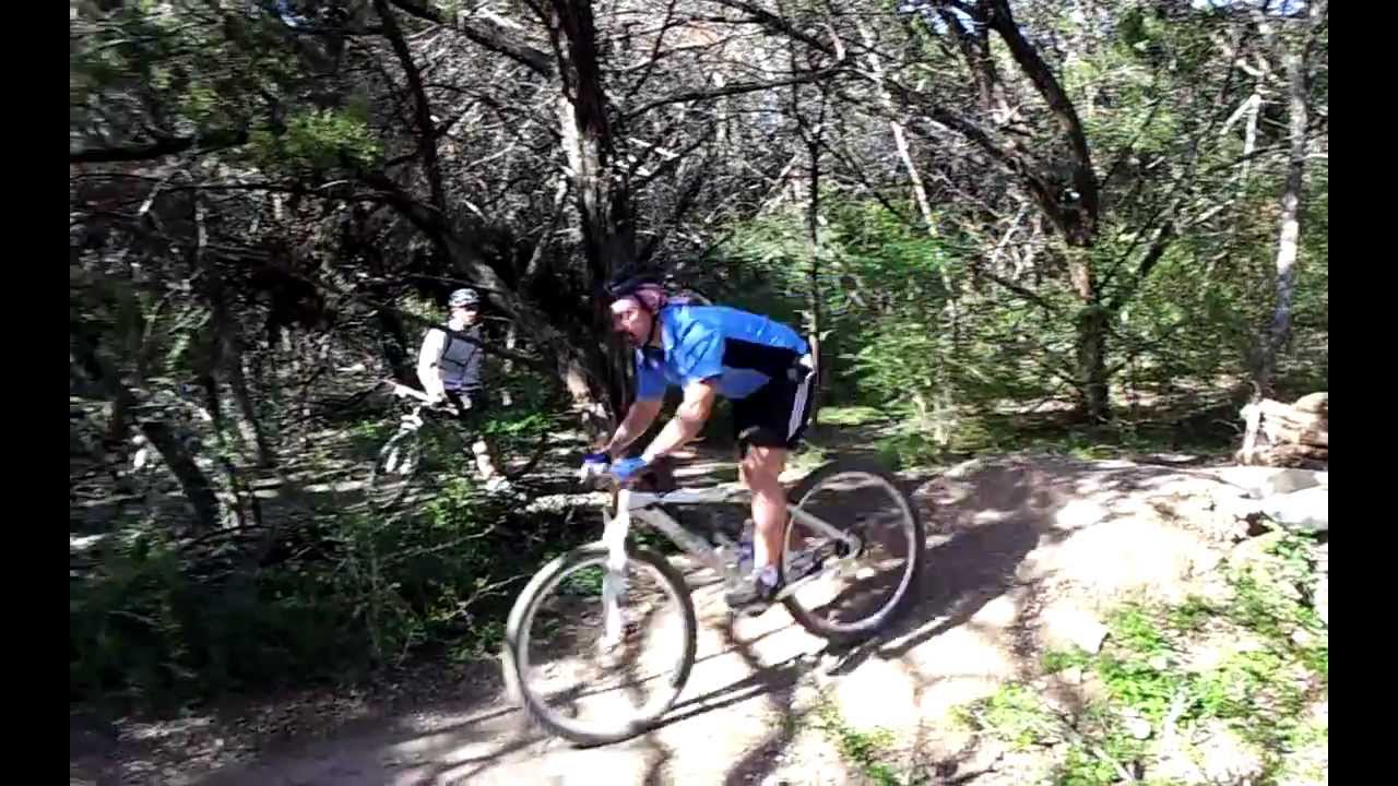 Mountain biking Fontman dirt jump in Big Cedar trail on the single